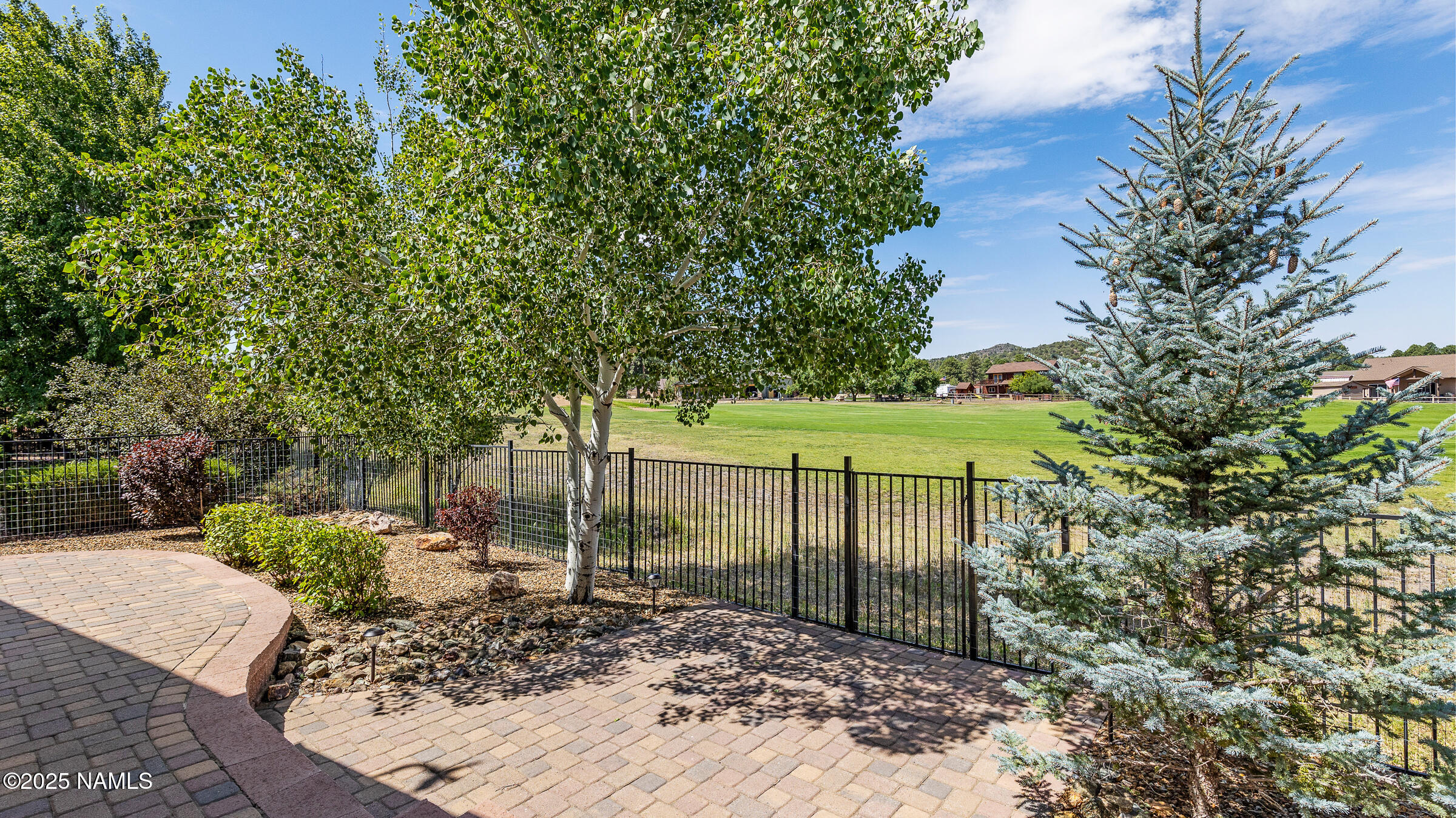 620 Brookline Loop Williams, AZ 86046 - Photo 34 of 38 a view of a house with a tree and a yard
