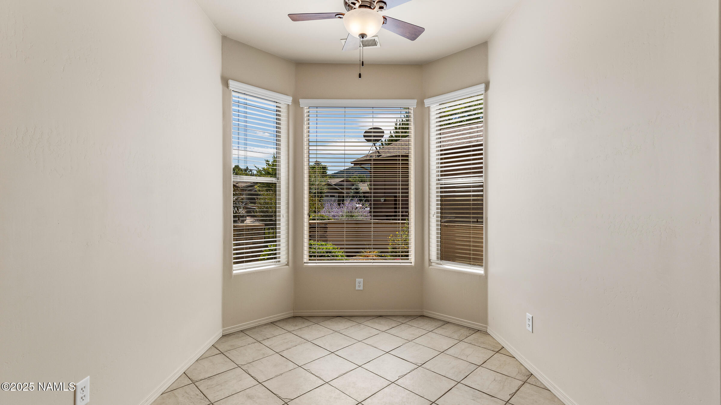 620 Brookline Loop Williams, AZ 86046 - Photo 9 of 38 a view of an empty room with a window
