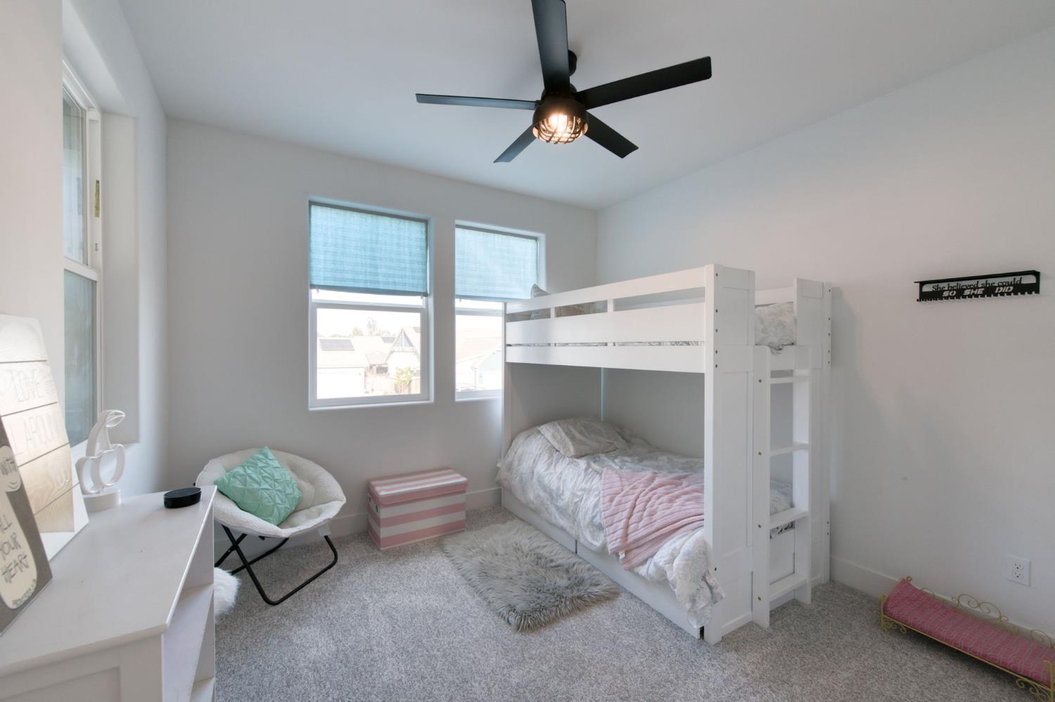 1736 North Renn Avenue Clovis, CA 93619 - Photo 34 of 66 a bedroom with a bed and a window