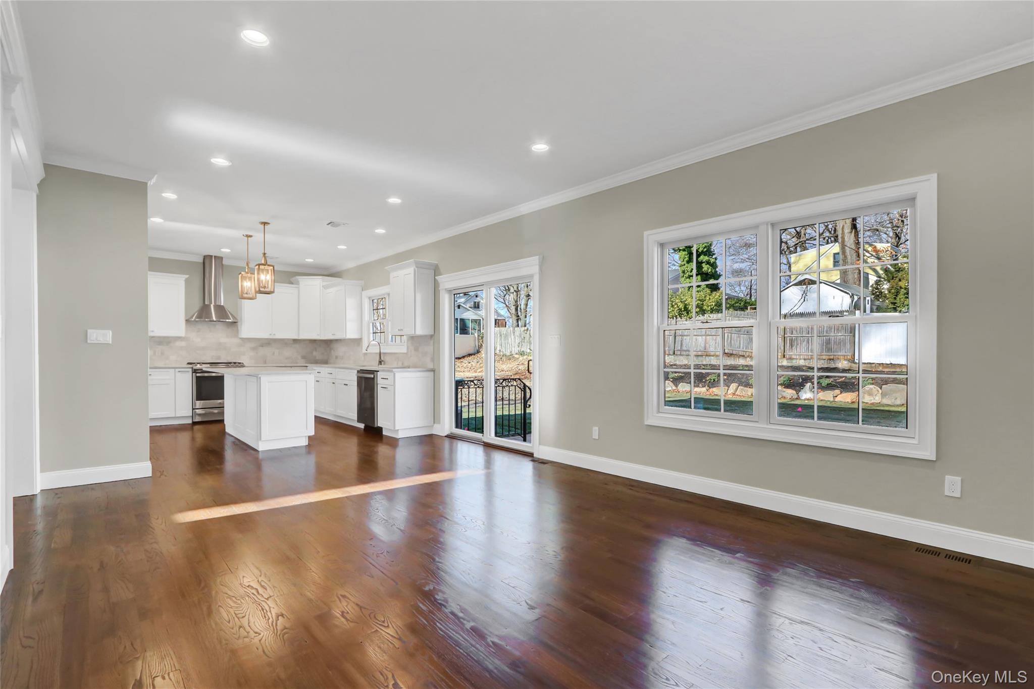 9 Hickory Road Bayville, NY 11709 - Photo 17 of 40 a view of kitchen with furniture and wooden floor