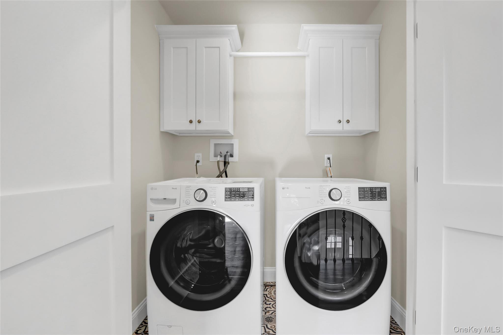 9 Hickory Road Bayville, NY 11709 - Photo 27 of 40 a utility room with dryer and washer