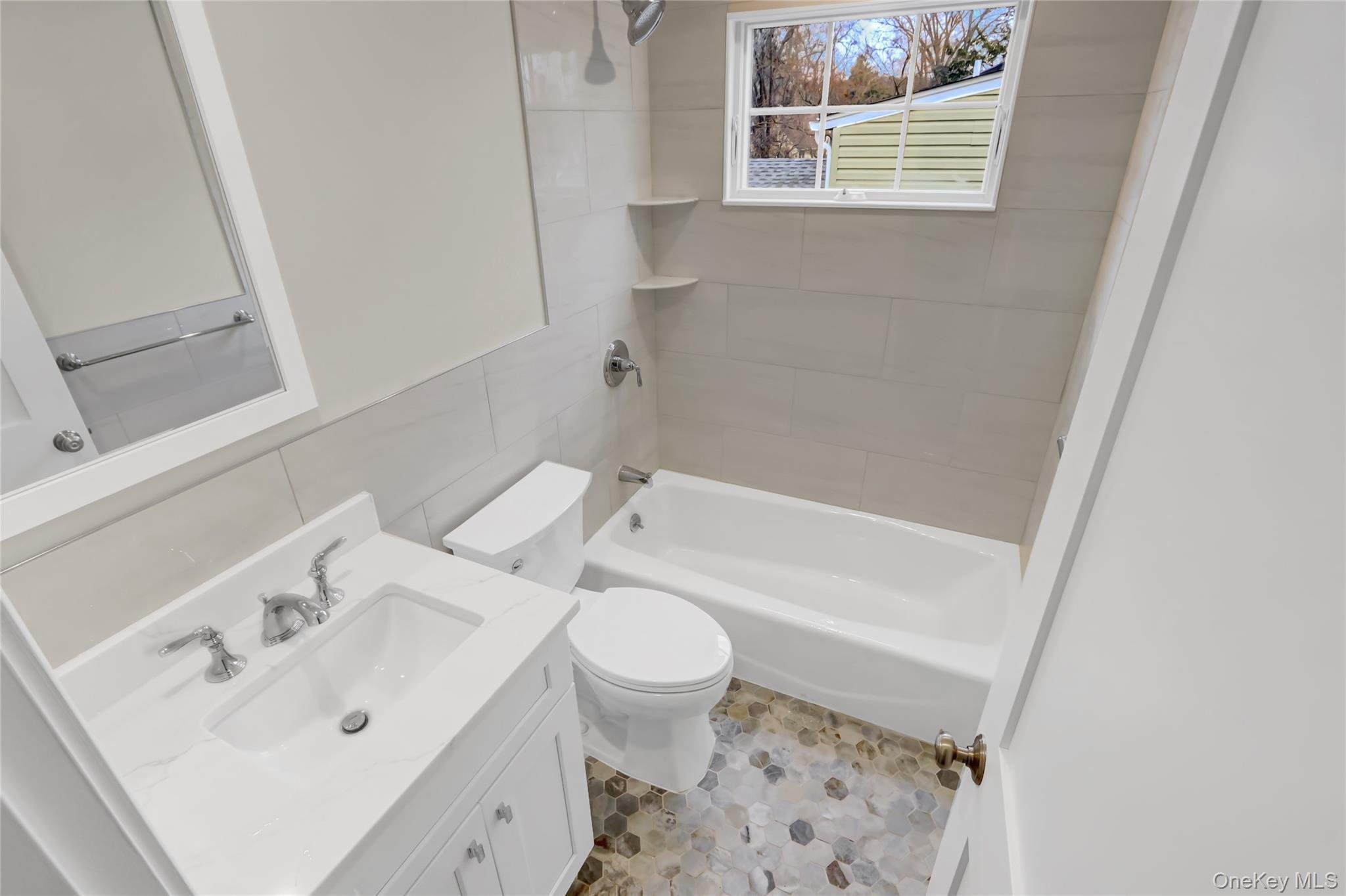 9 Hickory Road Bayville, NY 11709 - Photo 31 of 40 a bathroom with a sink toilet and shower