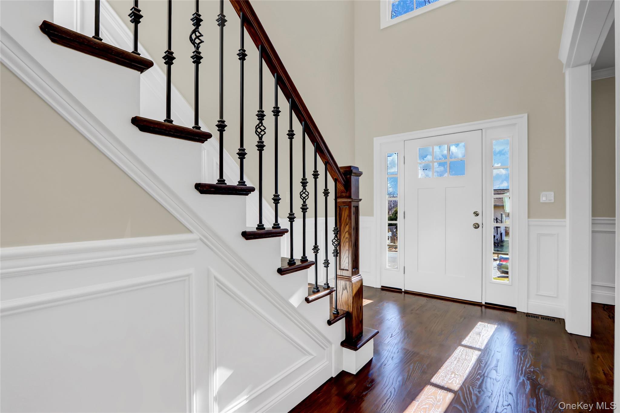 9 Hickory Road Bayville, NY 11709 - Photo 6 of 40 a view of entryway with wooden floor and stairs