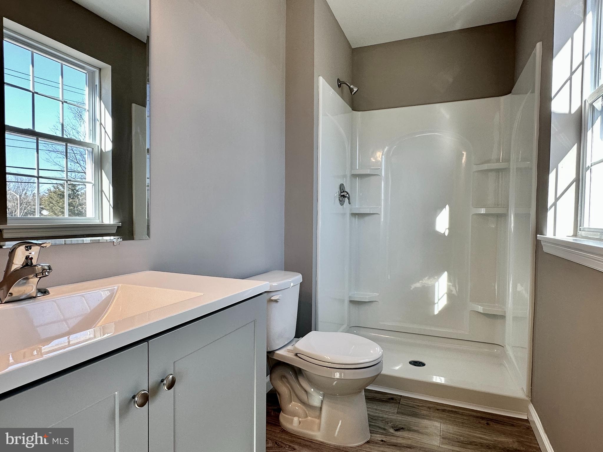 108 West Park Avenue Vineland, NJ 08360 - Photo 28 of 37 a bathroom with a sink a toilet and shower