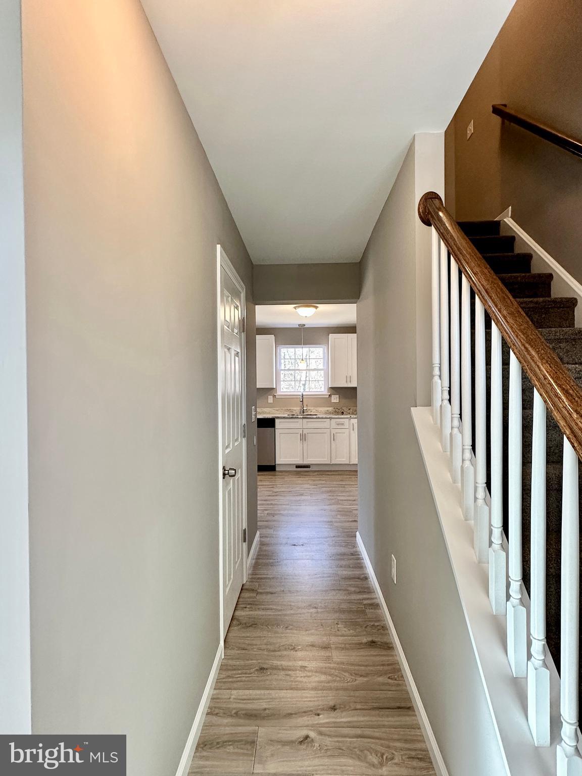 108 West Park Avenue Vineland, NJ 08360 - Photo 5 of 37 a view of a hallway with wooden floor