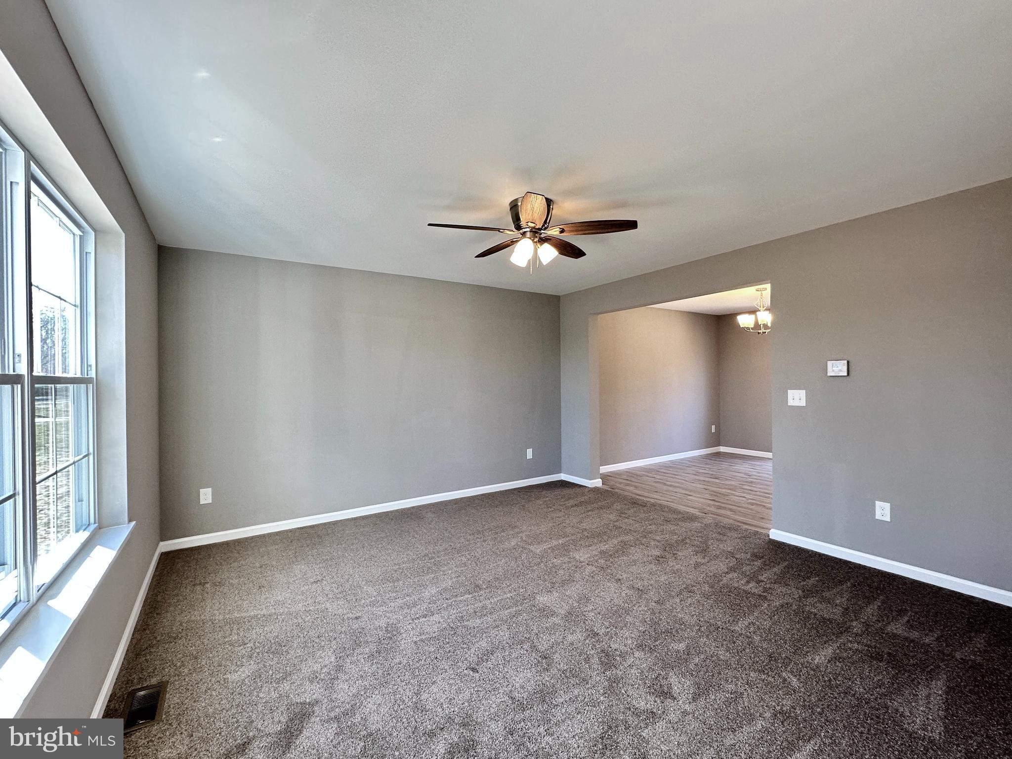 108 West Park Avenue Vineland, NJ 08360 - Photo 8 of 37 an empty room with fan and windows