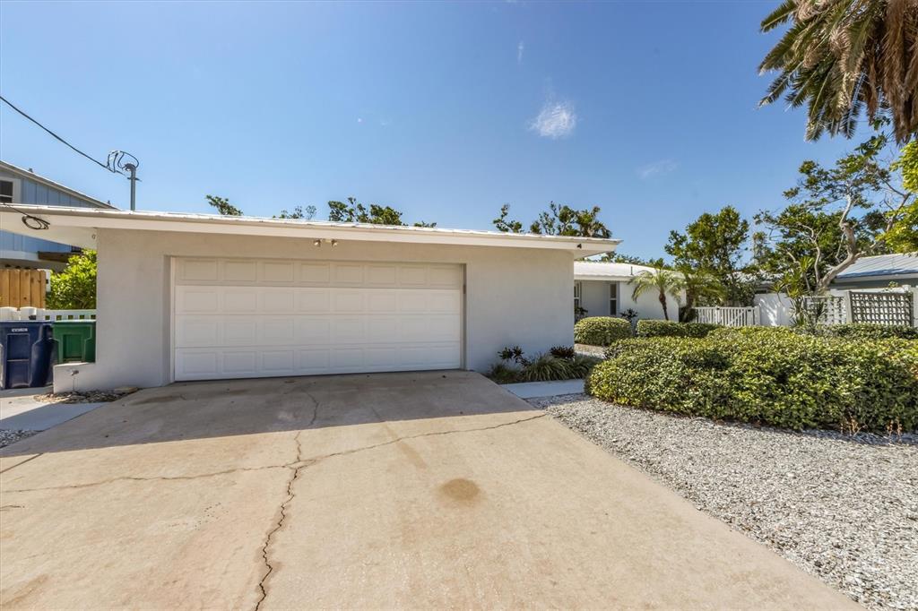 413 Poinsettia Road Anna Maria, FL 34216 - Photo 3 of 60 a view of a house with a outdoor space