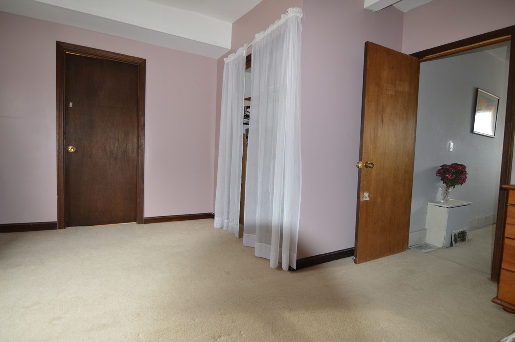 222 Whitins Road Sutton, MA 01590 - Photo 10 of 20 an empty room with window and bathroom