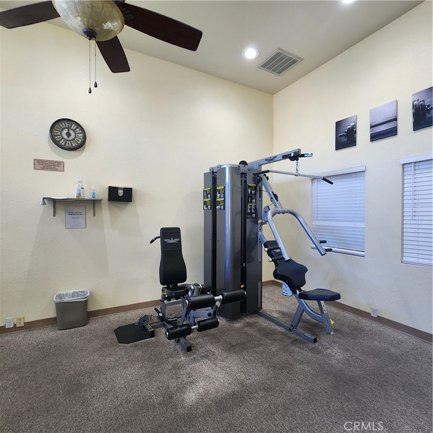 20843 Waalew Road, Unit C136 Apple Valley, CA 92307 - Photo 32 of 39 a view of a room with gym equipment