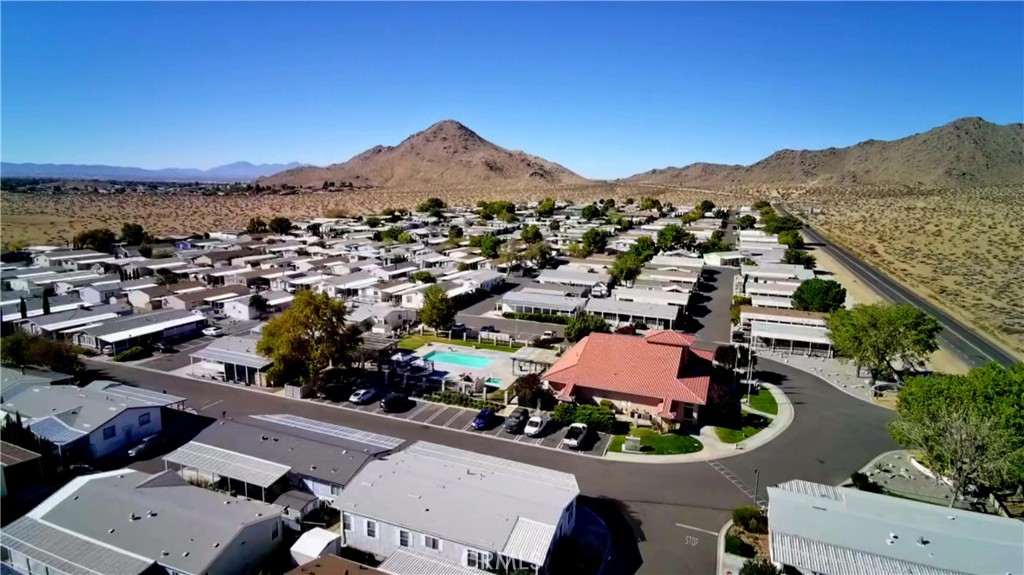 20843 Waalew Road, Unit C136 Apple Valley, CA 92307 - Photo 35 of 39 an aerial view of residential houses and outdoor space
