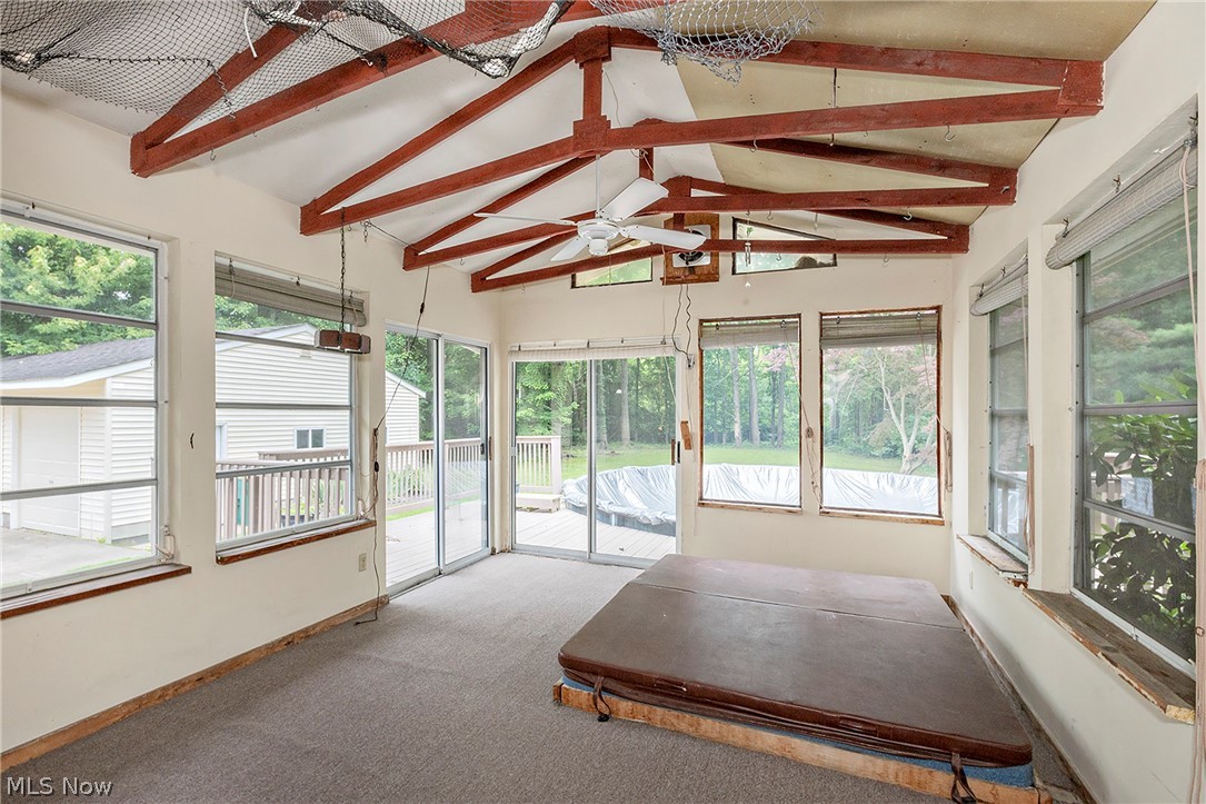 5339 East Heisley Road Mentor, OH 44060 - Photo 9 of 24 3 Season Room with beamed ceiling & fan, and hot tub!
