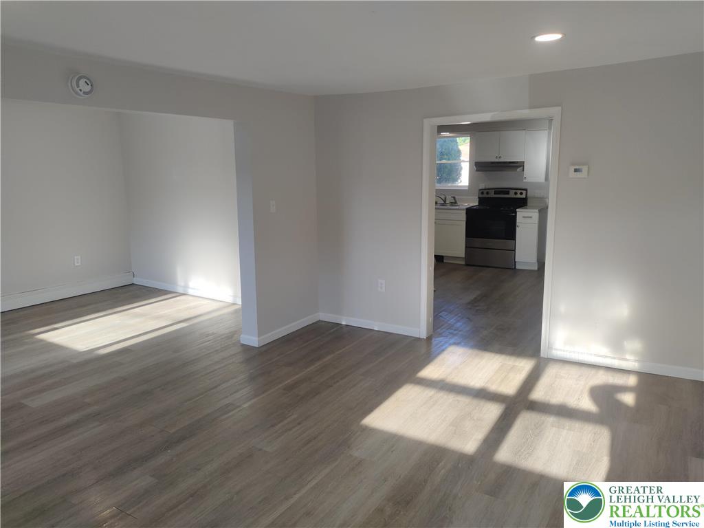 25 Franklin Street Weatherly, PA 18255 - Photo 16 of 40 a view of empty room with kitchen and window