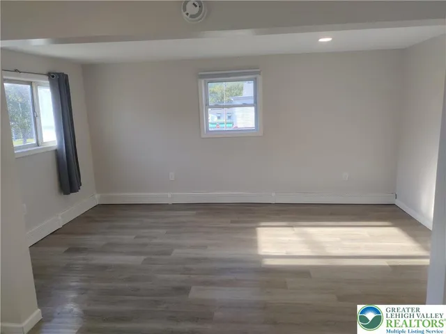 a view of a window in an empty room