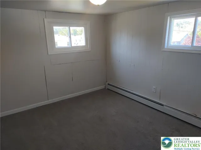 an empty room with a window