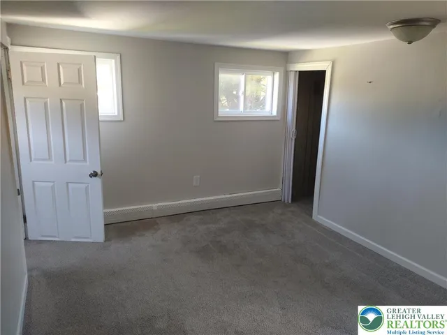 a view of a room with a hallway