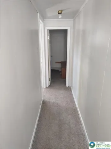 a bathroom with a toilet and a sink