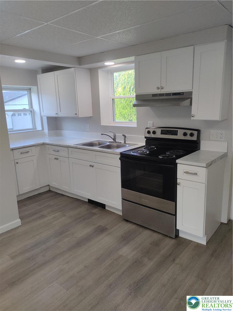 25 Franklin Street Weatherly, PA 18255 - Photo 5 of 40 a kitchen with sink stove and cabinets