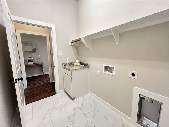a bathroom with a sink and mirror