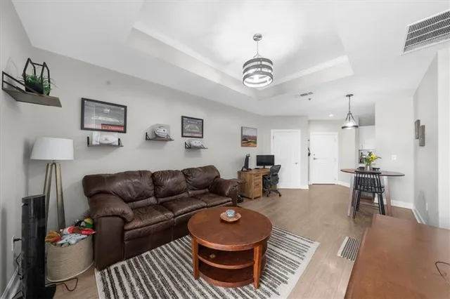 a living room with furniture and a table