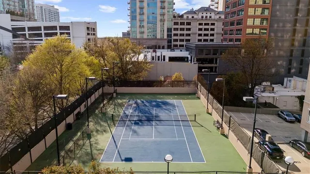 a view of a balcony with chairs