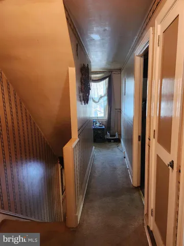 a view of hallway with stairs