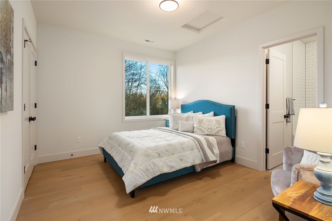 23517 7th Avenue Southeast Bothell, WA 98021 - Photo 19 of 32 a bedroom with a bed and a window