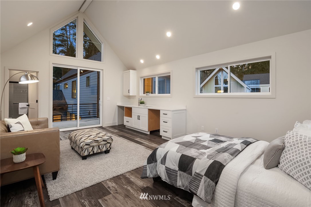 23517 7th Avenue Southeast Bothell, WA 98021 - Photo 29 of 32 a bedroom with furniture and a large window