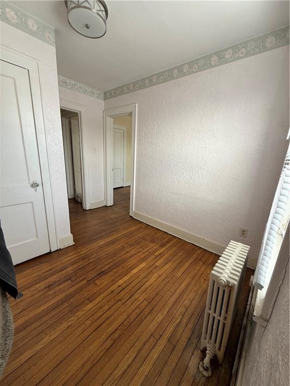 2332 Sherbrook Street Pittsburgh, PA 15217 - Photo 12 of 40 a view of an empty room with wooden floor and a window