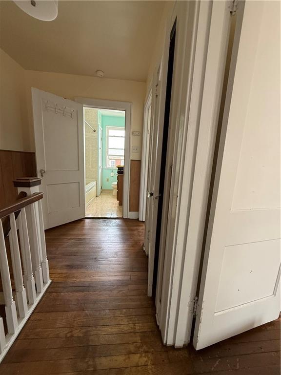2332 Sherbrook Street Pittsburgh, PA 15217 - Photo 14 of 40 a view of a hallway with wooden floor and stairs