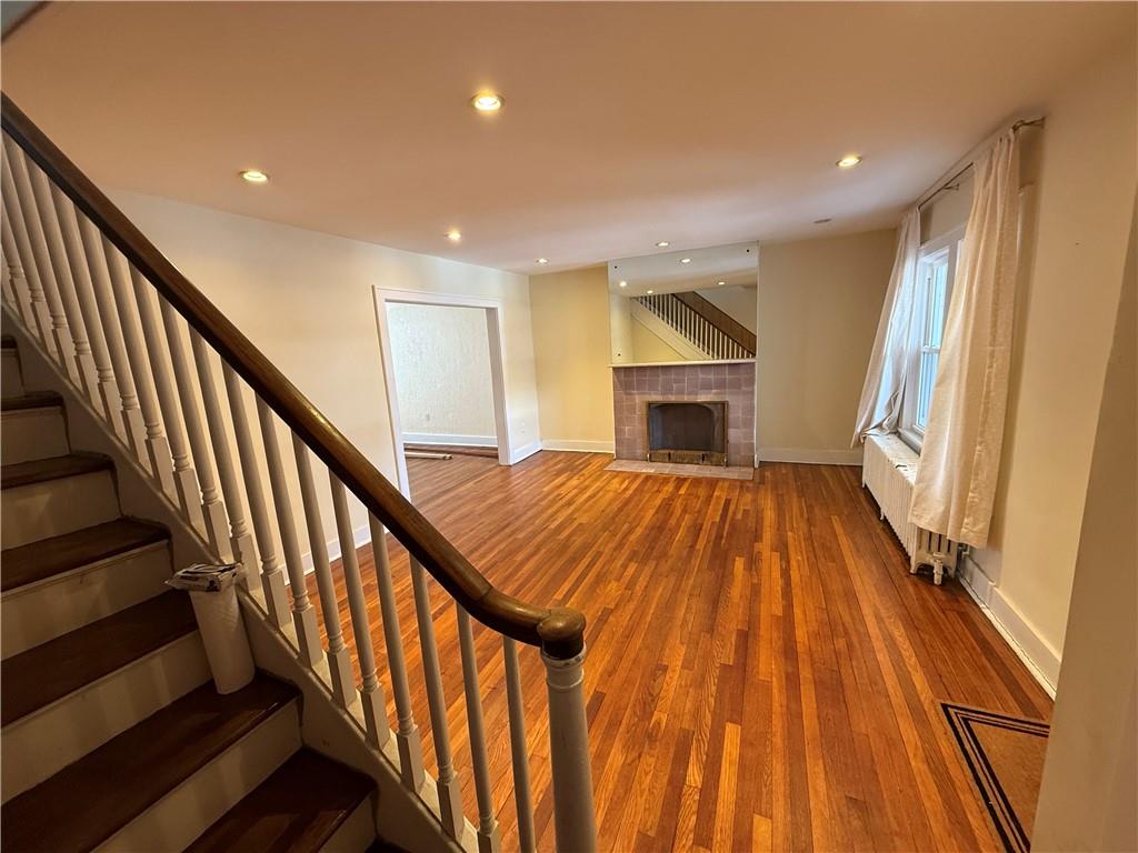 2332 Sherbrook Street Pittsburgh, PA 15217 - Photo 26 of 40 a view of an entryway with wooden floor and staircase