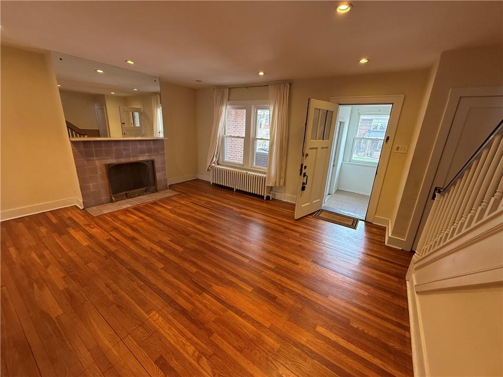 2332 Sherbrook Street Pittsburgh, PA 15217 - Photo 28 of 40 a view of an empty room with wooden floor and a window