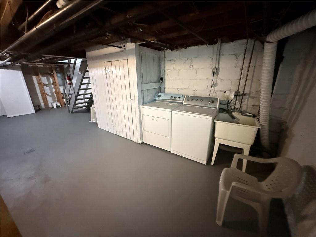 2332 Sherbrook Street Pittsburgh, PA 15217 - Photo 36 of 40 a kitchen with a refrigerator and white cabinets