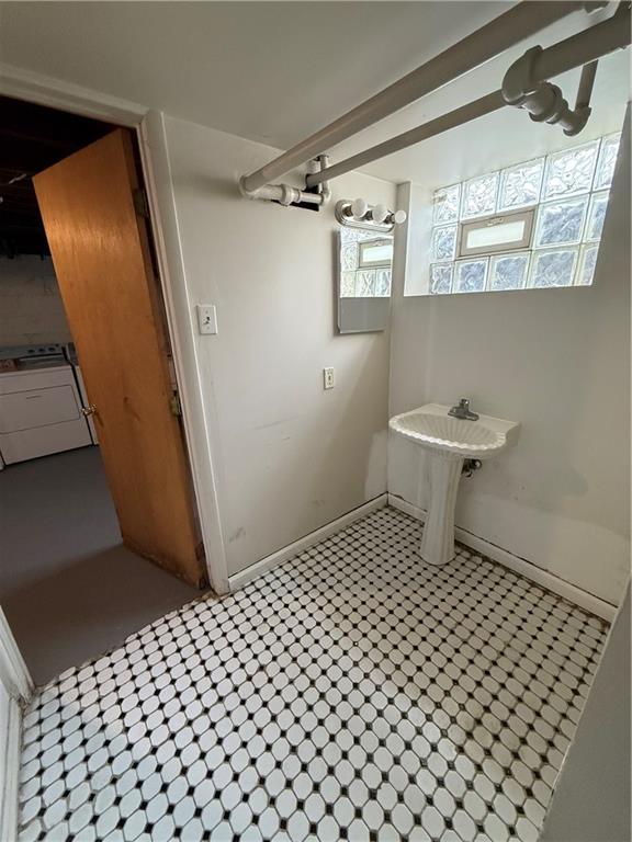 2332 Sherbrook Street Pittsburgh, PA 15217 - Photo 38 of 40 a bathroom with a sink a toilet and mirror