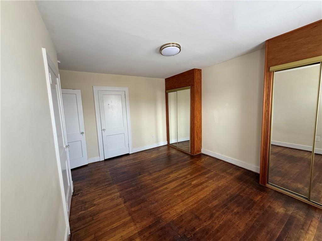 2332 Sherbrook Street Pittsburgh, PA 15217 - Photo 7 of 40 an empty room with wooden floor and closet