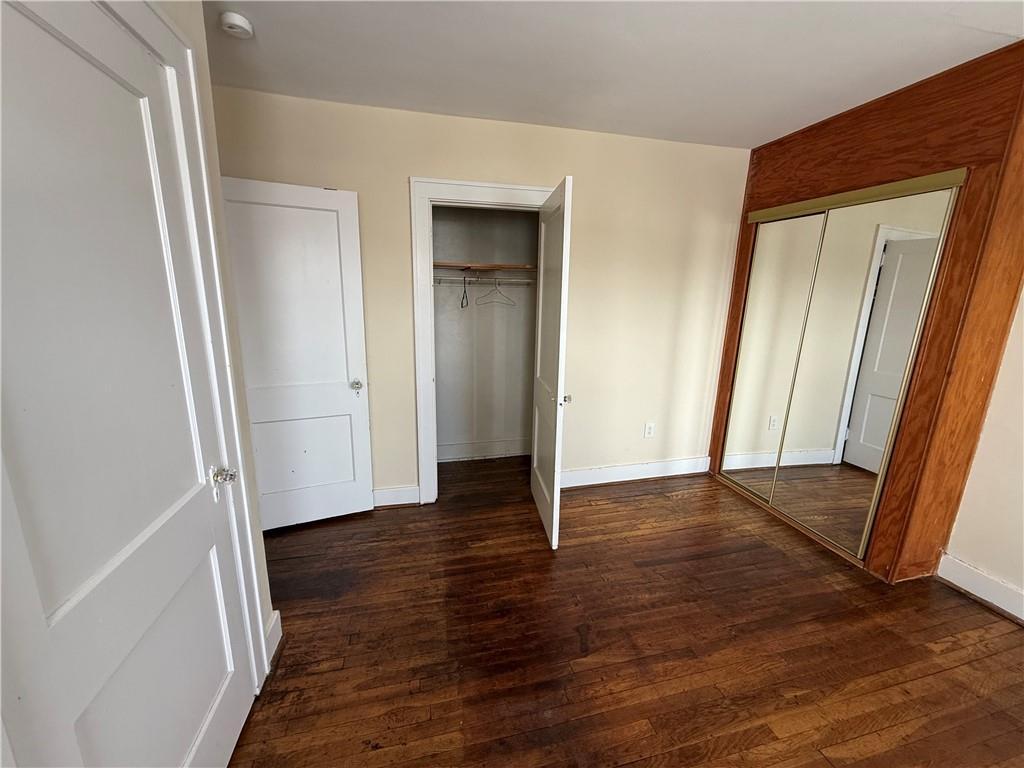 2332 Sherbrook Street Pittsburgh, PA 15217 - Photo 8 of 40 an empty room with wooden floor and closet