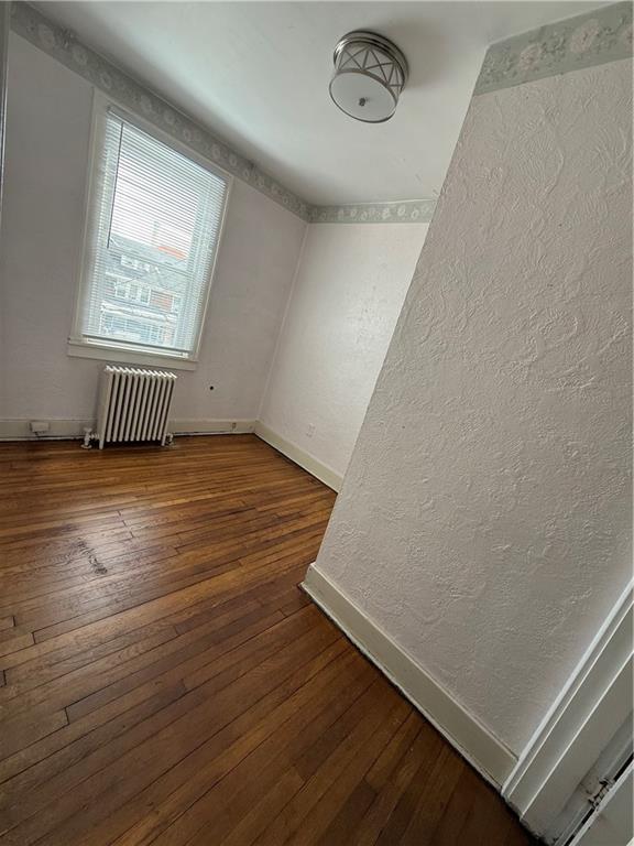 2332 Sherbrook Street Pittsburgh, PA 15217 - Photo 9 of 40 an empty room with wooden floor and windows