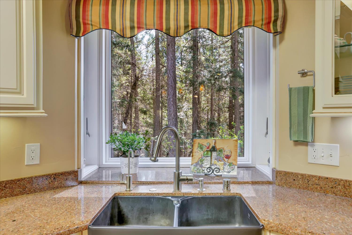 10973 Scotts Flat Dam Road Nevada City, CA 95959 - Photo 24 of 91 a kitchen with a sink and a large window