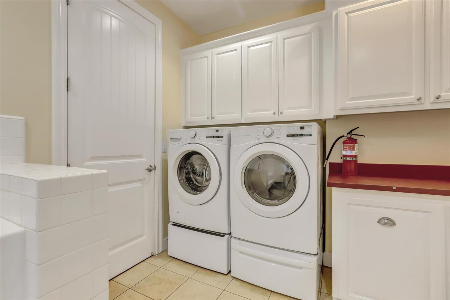 10973 Scotts Flat Dam Road Nevada City, CA 95959 - Photo 29 of 91 a utility room with dryer and washer