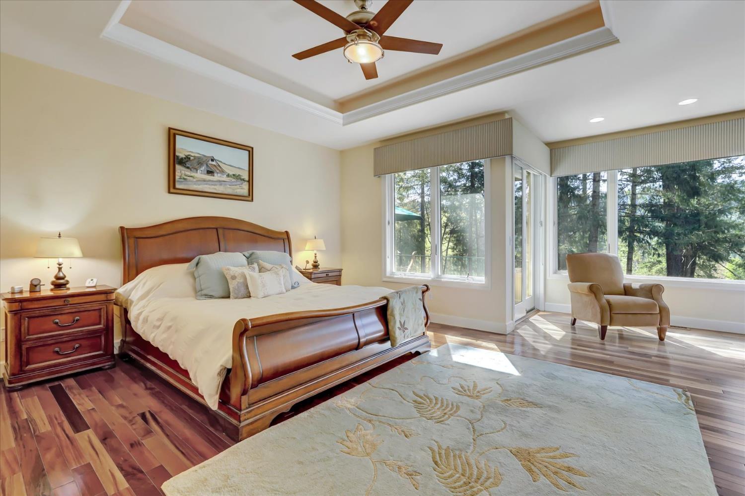 10973 Scotts Flat Dam Road Nevada City, CA 95959 - Photo 32 of 91 a bedroom with a bed and a large window