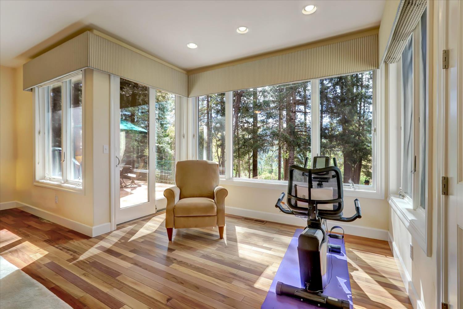 10973 Scotts Flat Dam Road Nevada City, CA 95959 - Photo 35 of 91 a livingroom with furniture wooden floor and windows