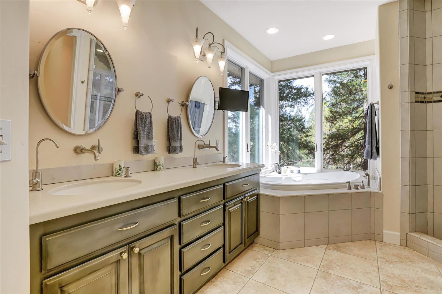 10973 Scotts Flat Dam Road Nevada City, CA 95959 - Photo 37 of 91 a bathroom with a sink and a mirror