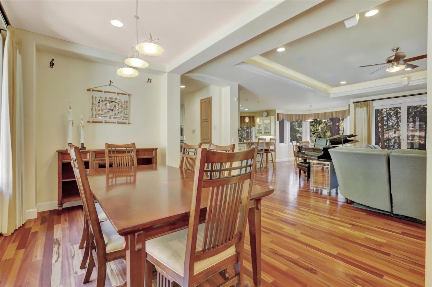 10973 Scotts Flat Dam Road Nevada City, CA 95959 - Photo 9 of 91 a view of a dining room with furniture and wooden floor