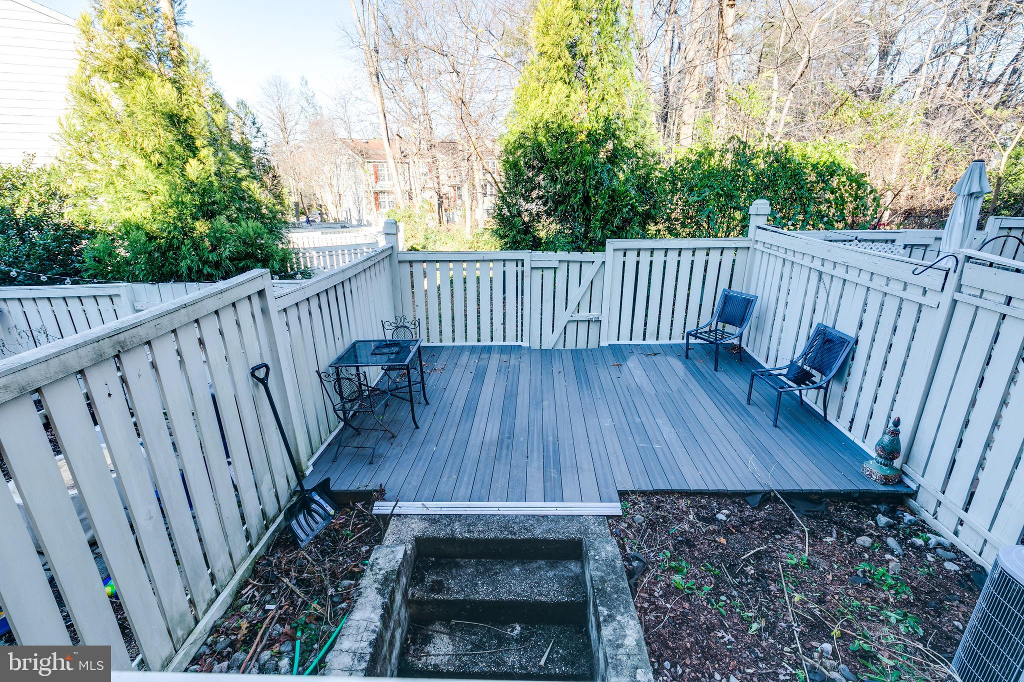 1589 Woodcrest Drive Reston, VA 20194 - Photo 25 of 29 a balcony with wooden floor and fence