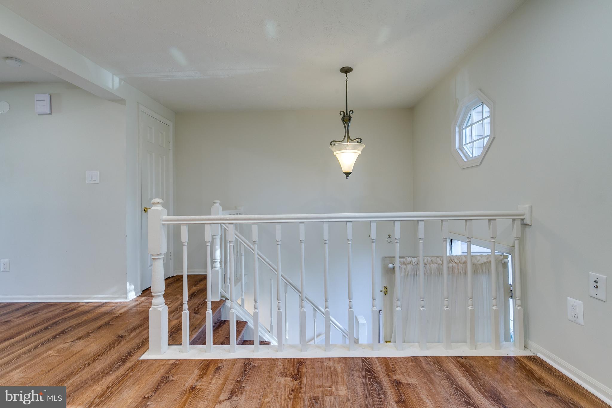 1589 Woodcrest Drive Reston, VA 20194 - Photo 6 of 29 a view of wooden floor and workspace