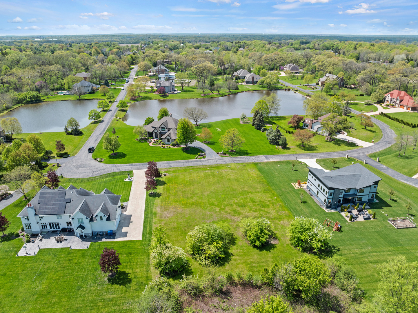 4N707 White Oak Lane Wayne, IL 60184 - Photo 3 of 5 a view of a lake with a mountain in the back yard
