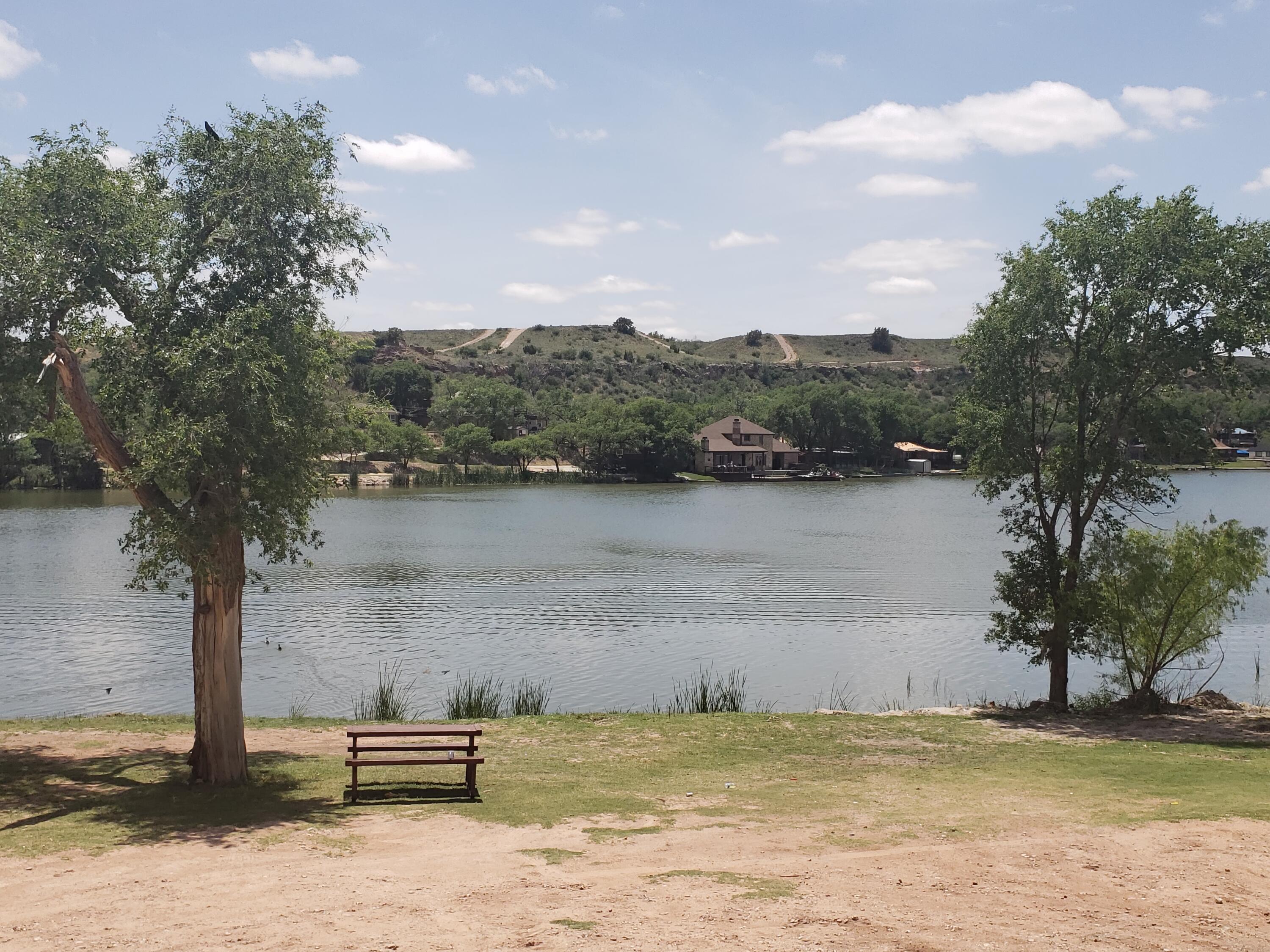 a view of a lake with a mountain and lake view