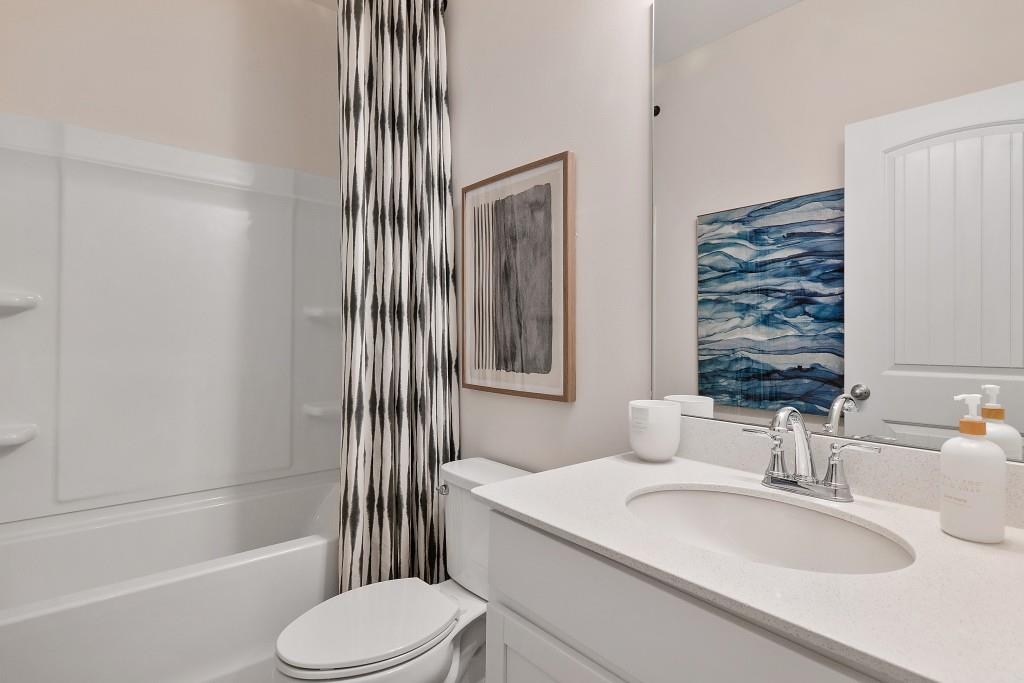 57 Scout Way Newnan, GA 30263 - Photo 12 of 37 a bathroom with a sink toilet and shower