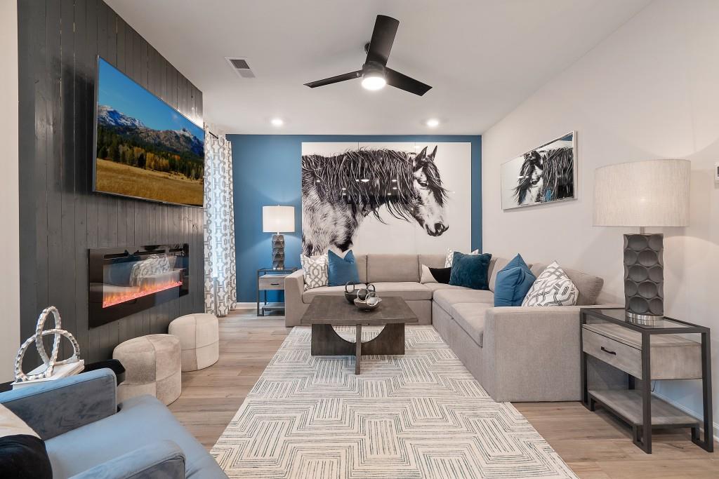 57 Scout Way Newnan, GA 30263 - Photo 18 of 37 a living room with furniture and a fireplace