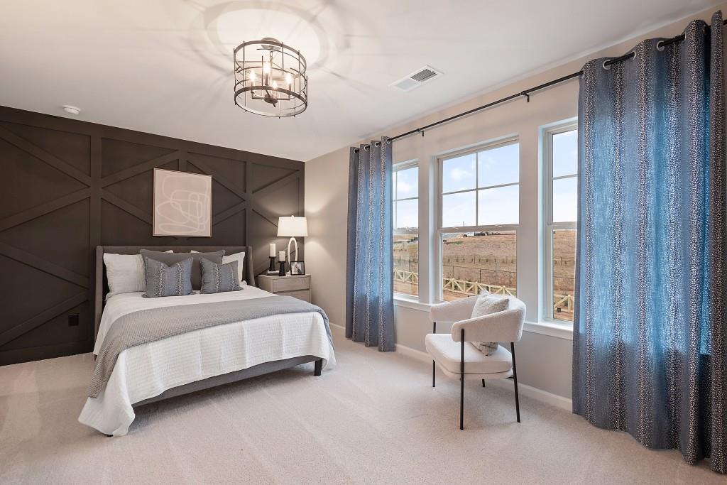 57 Scout Way Newnan, GA 30263 - Photo 23 of 37 a bedroom with a bed and a window