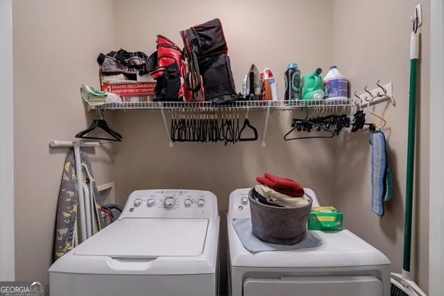 a backyard with plants and outdoor seating